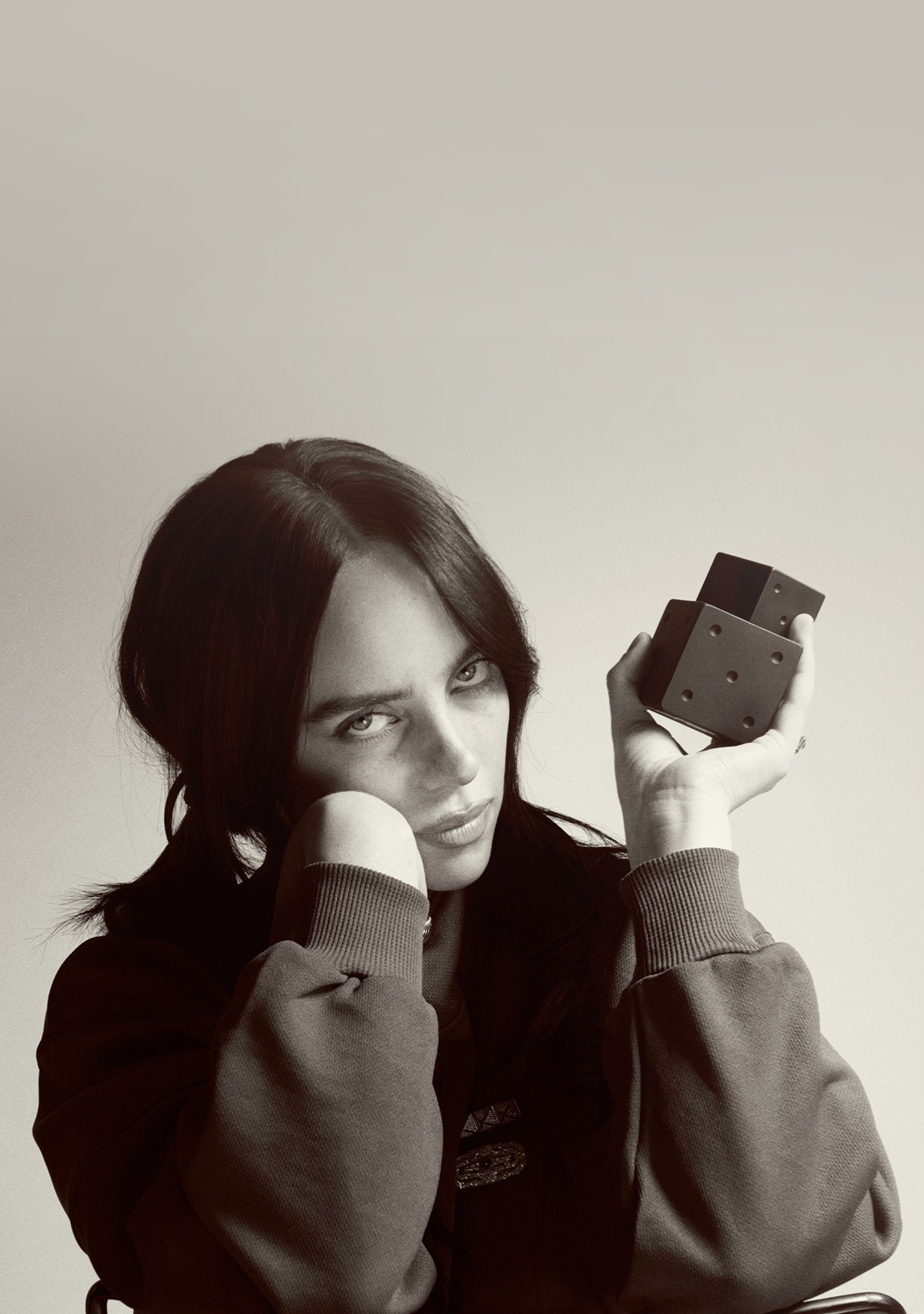 Billie Eilish holding Your Turn Fragrance