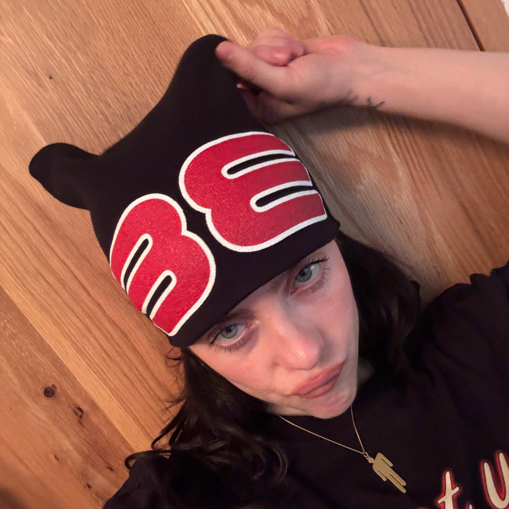 billie wearing BE Square Woven Beanie